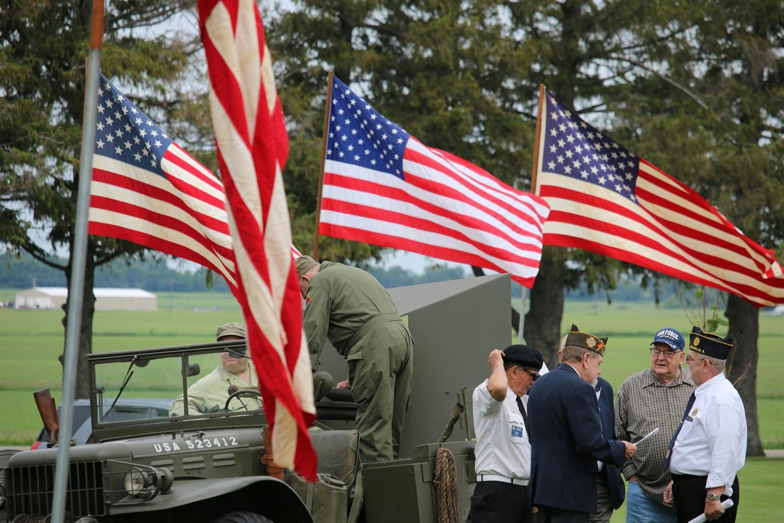 Veterans standing together during a patriotic ceremony